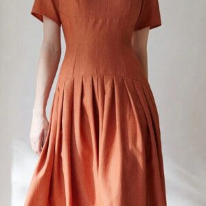 rust-orange frock