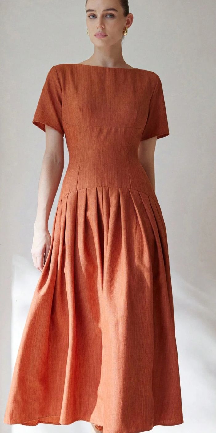 rust-orange frock